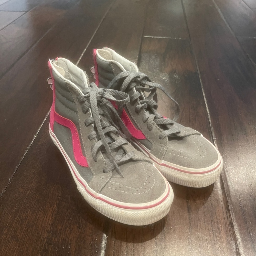 Vans High Top sneaker.  Only worn a few times!  Like new condition